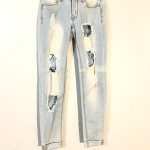 Light wash jeans with holes